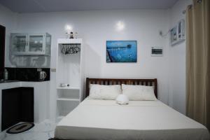 Ένα ή περισσότερα κρεβάτια σε δωμάτιο στο Jmt Star's Inn