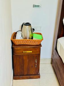 Facilități de preparat ceai și cafea la Yumiverdant Heaven Hotel