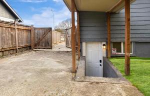 a white door in the side of a house at Renton DT 1BR Suite WS 95 Near Landing &Sea-Tac in Renton