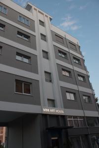 a tall building with a main art house at Mini Art House in Nicosia