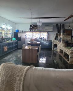 Et opholdsområde på Suítes Sonhos e Requinte + 26 billeder