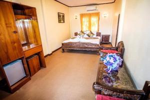 Giường trong phòng chung tại Pai Hill Side Resort