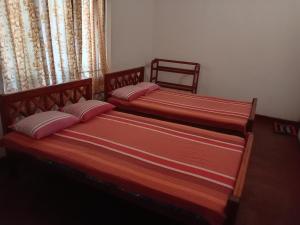 Ένα ή περισσότερα κρεβάτια σε δωμάτιο στο Country Cottage +4 φωτογραφίες