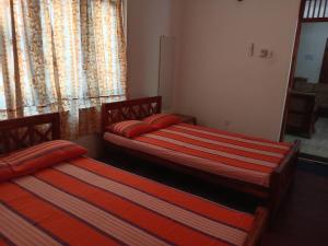 Ένα ή περισσότερα κρεβάτια σε δωμάτιο στο Country Cottage