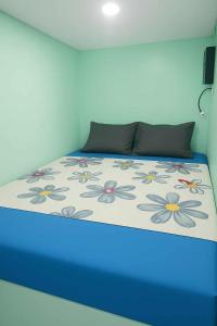 Ένα ή περισσότερα κρεβάτια σε δωμάτιο στο Uni Capsules