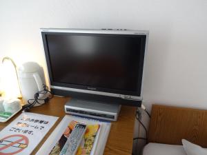 TV a/nebo společenská místnost v ubytování Hotel Koshien