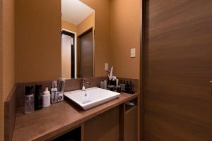Een badkamer bij The CALM Hotel Tokyo