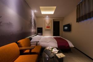 Postel nebo postele na pokoji v ubytování The CALM Hotel Tokyo
