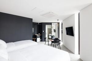 Кровать или кровати в номере Boutique Hotel BomBom