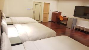 Una habitación de 橙柊棧 CZ Inn