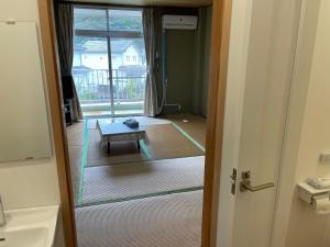 Koupelna v ubytování 安房リゾート旅館 臨海臥龍 + 38 fotografií