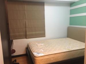 Giường trong phòng chung tại Eton Baypark Manila