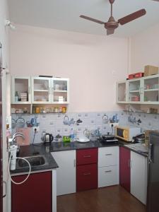 Køkken eller tekøkken på Sakalam homestay