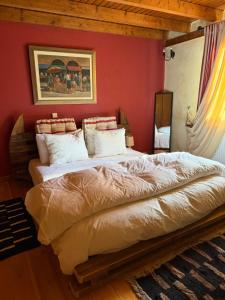 Ένα ή περισσότερα κρεβάτια σε δωμάτιο στο Santa House