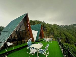 Φωτογραφία από το άλμπουμ του Huts nathia Gali σε Bāzār