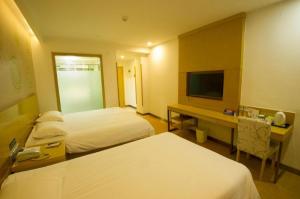 Μια τηλεόραση ή/και κέντρο ψυχαγωγίας στο GreenTree Inn Binzhou Bus Station