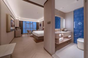 Ένα μπάνιο στο Orange Crystal Nanchang Honggutan MixC Hotel
