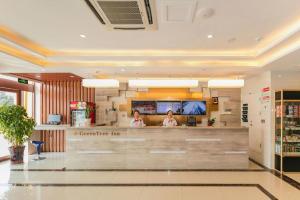 Μια τηλεόραση ή/και κέντρο ψυχαγωγίας στο GreenTree Inn Qufu High Speed Railway Station