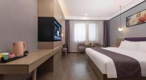 Fotografie z fotogalerie ubytování GYA Jiaxing Tongxiang City Century Avenue Hotel v destinaci Tongxiang