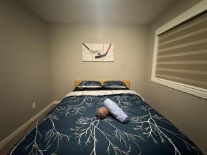 En eller flere senge i et værelse på Private Cozy Room