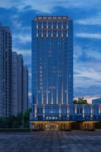 Fotografie z fotogalerie ubytování 郑州东站万象城酒店 v destinaci Xingzhuang