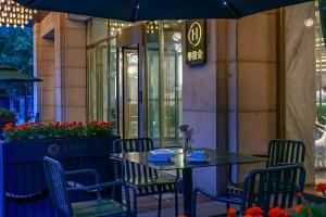 Fotografie z fotogalerie ubytování 郑州东站万象城酒店 v destinaci Xingzhuang