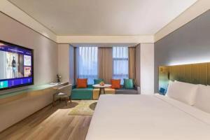 Fotografie z fotogalerie ubytování 郑州东站万象城酒店 v destinaci Xingzhuang