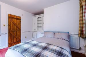 En eller flere senge i et værelse på Apple House by Staycay + 34 billeder