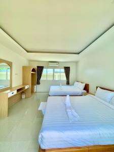 Postel nebo postele na pokoji v ubytování Le poulet poolvilla khanom