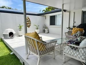 Et opholdsområde på Family Beachside Getaway + 6 billeder