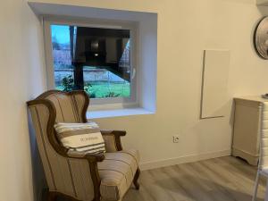 Posezení v ubytování Chez Laurent