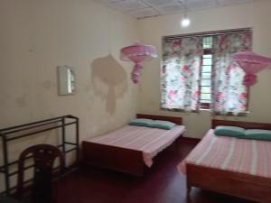 Ένα ή περισσότερα κρεβάτια σε δωμάτιο στο Country Cottage