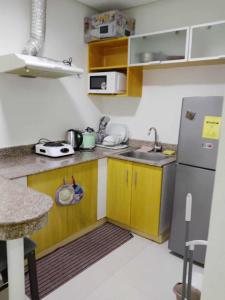 Kuchyň nebo kuchyňský kout v ubytování Birch tower condo for renting