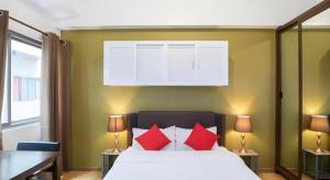 Postel nebo postele na pokoji v ubytování OYO 91974 Alfisal Syariah