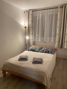 Ένα ή περισσότερα κρεβάτια σε δωμάτιο στο Airappartment trojizbový byt