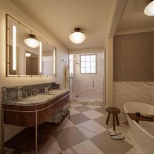 a bathroom with a large mirror and a tub and a sink at The Huntington Hotel in San Francisco