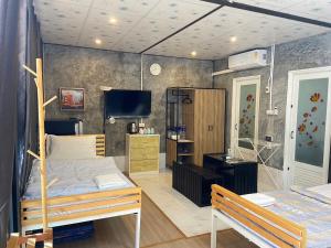 Ένα ή περισσότερα κρεβάτια σε δωμάτιο στο Riverside Khao Yai