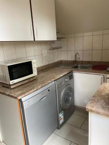 Nhà bếp/bếp nhỏ tại Cottage apartment