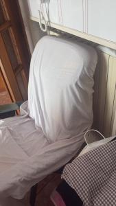 En eller flere senge i et værelse på 23 Passi Dal Centro