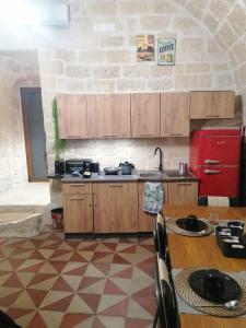 Η κουζίνα ή μικρή κουζίνα στο Room Pietra Bianca