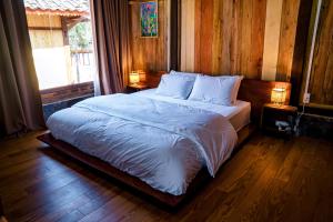 Ένα ή περισσότερα κρεβάτια σε δωμάτιο στο Balana HaGiang