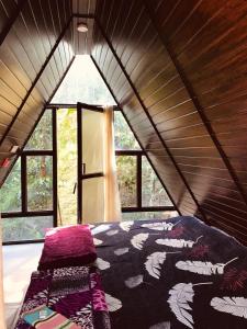 Ένα ή περισσότερα κρεβάτια σε δωμάτιο στο Happy Feet Adventure +20 φωτογραφίες