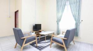 Φωτογραφία από το άλμπουμ του OYO 89607 Aloha Chalet σε Kampung Raja