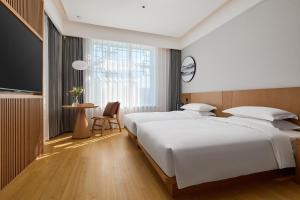 Gallery image of Floral Hotel Banlan China Korean Folk Park  +26 photos