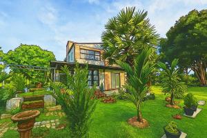 Κήπος έξω από το Riverside Khao Yai