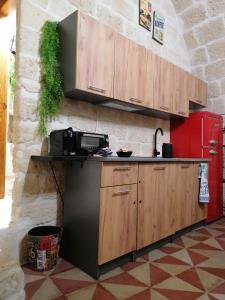 Η κουζίνα ή μικρή κουζίνα στο Room Pietra Bianca