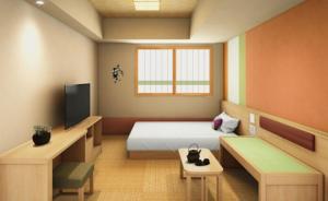 Giường trong phòng chung tại 天然温泉 越前の湯 御宿野乃福井