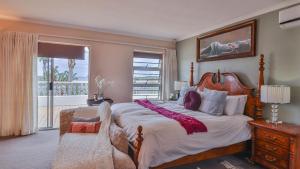 Ένα ή περισσότερα κρεβάτια σε δωμάτιο στο Wokuphumla