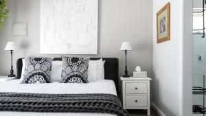 Ένα ή περισσότερα κρεβάτια σε δωμάτιο στο Elsa Hepburn Springs