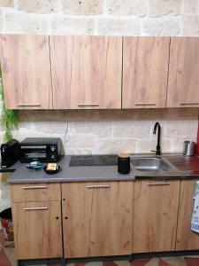 Η κουζίνα ή μικρή κουζίνα στο Room Pietra Bianca +16 φωτογραφίες